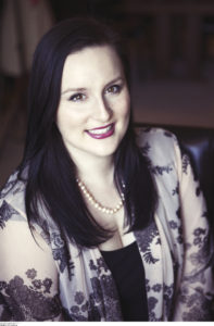 A picture of author Stefanie London, who wrote The Dachsund Wears Prada