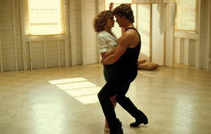 An image of Patrick Swayze and Jennifer Grey dancing from the movie, Dirty Dancing
