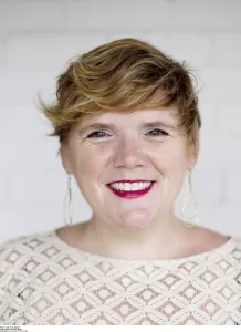 A headshot image of author Molly Fader