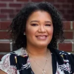 A headshot image of author, Lane Clark