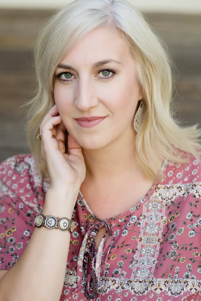 A headshot image of author, Amber Garza