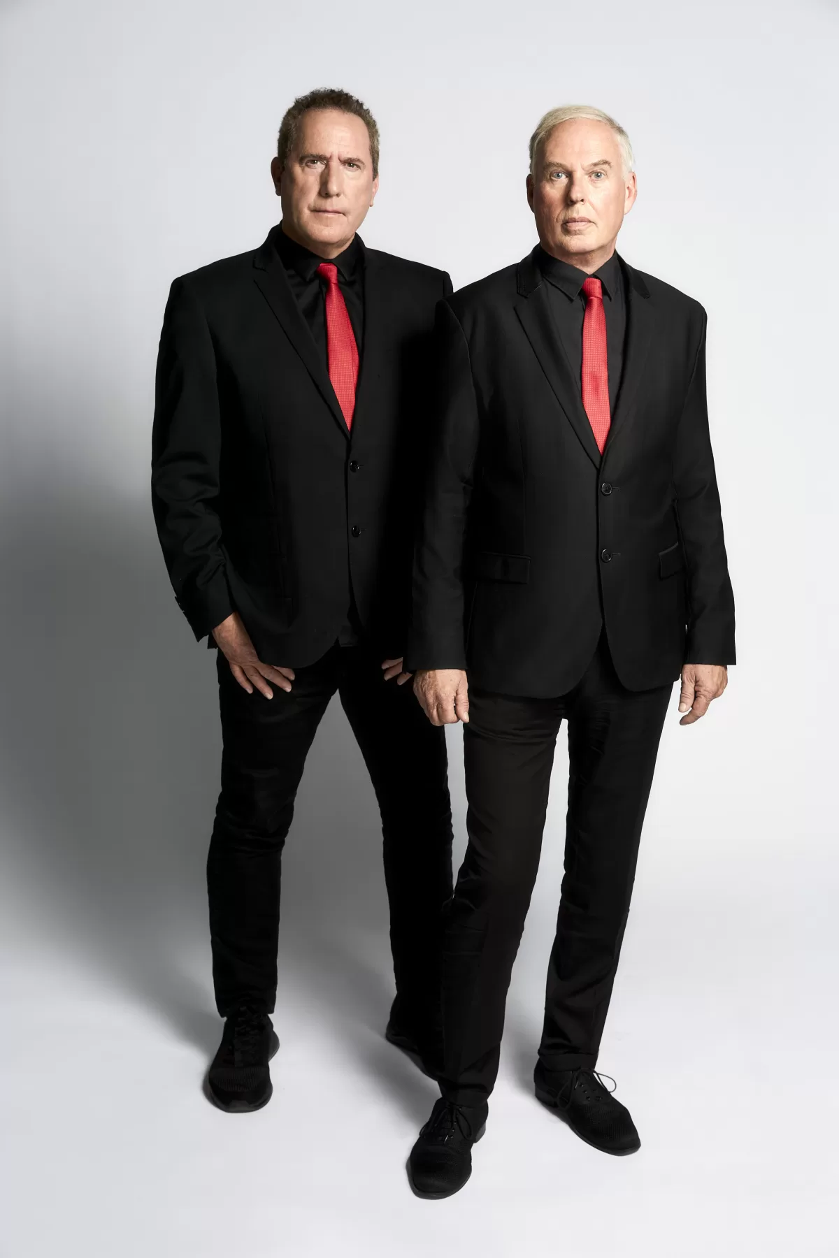 A full-body shot of the members of the musical duo group, OMD