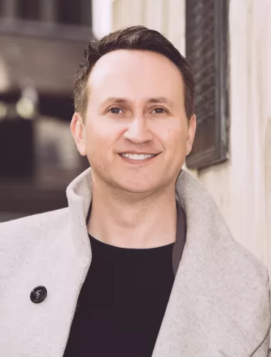 A headshot image of author, John Marrs
