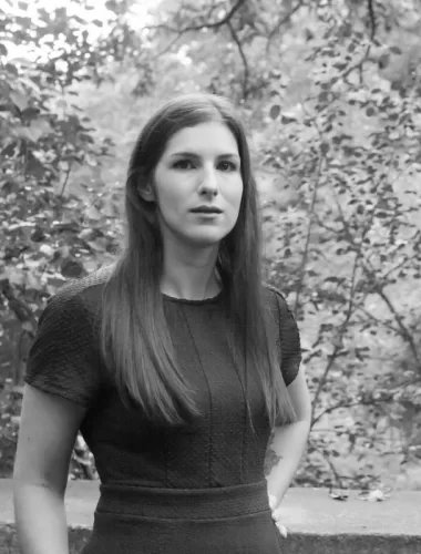 A half body head shot of author, Hester Fox