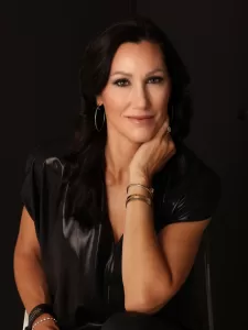 A close up headshot image of author, Kimberly Belle