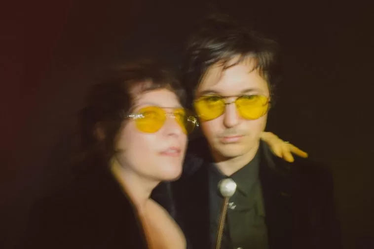 A slightly blurred image of singers and musicians, Cary Ann Hearst and Michael Trent, of Shovels and Rope