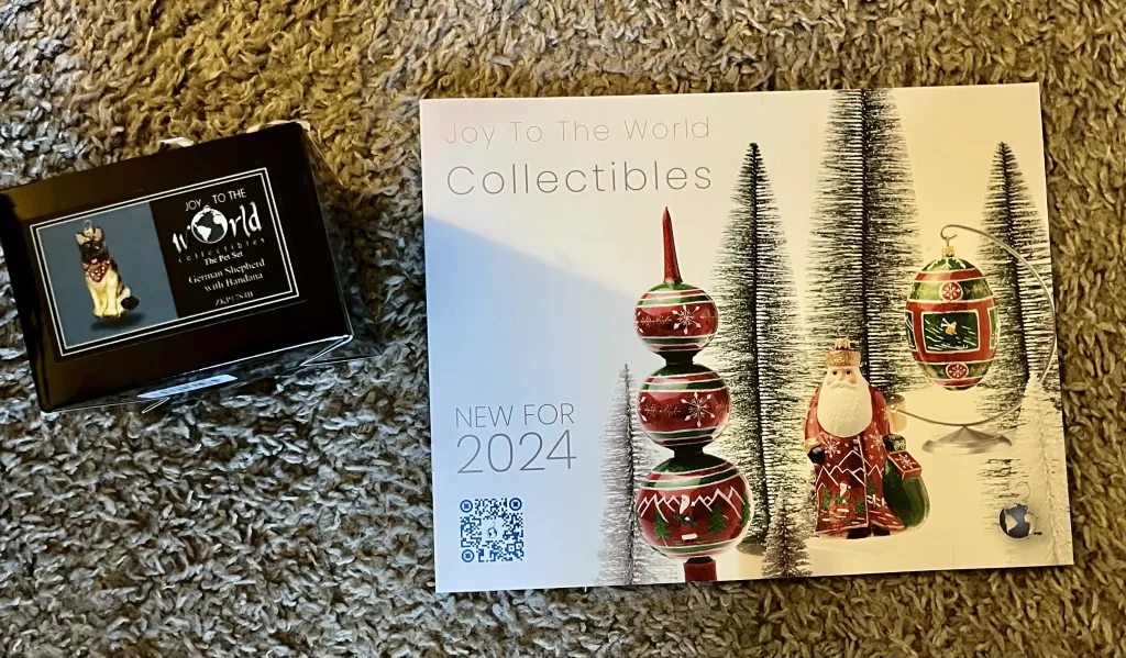 An image of the ornament box and the 2024 Joy to the World Collectible Catalog