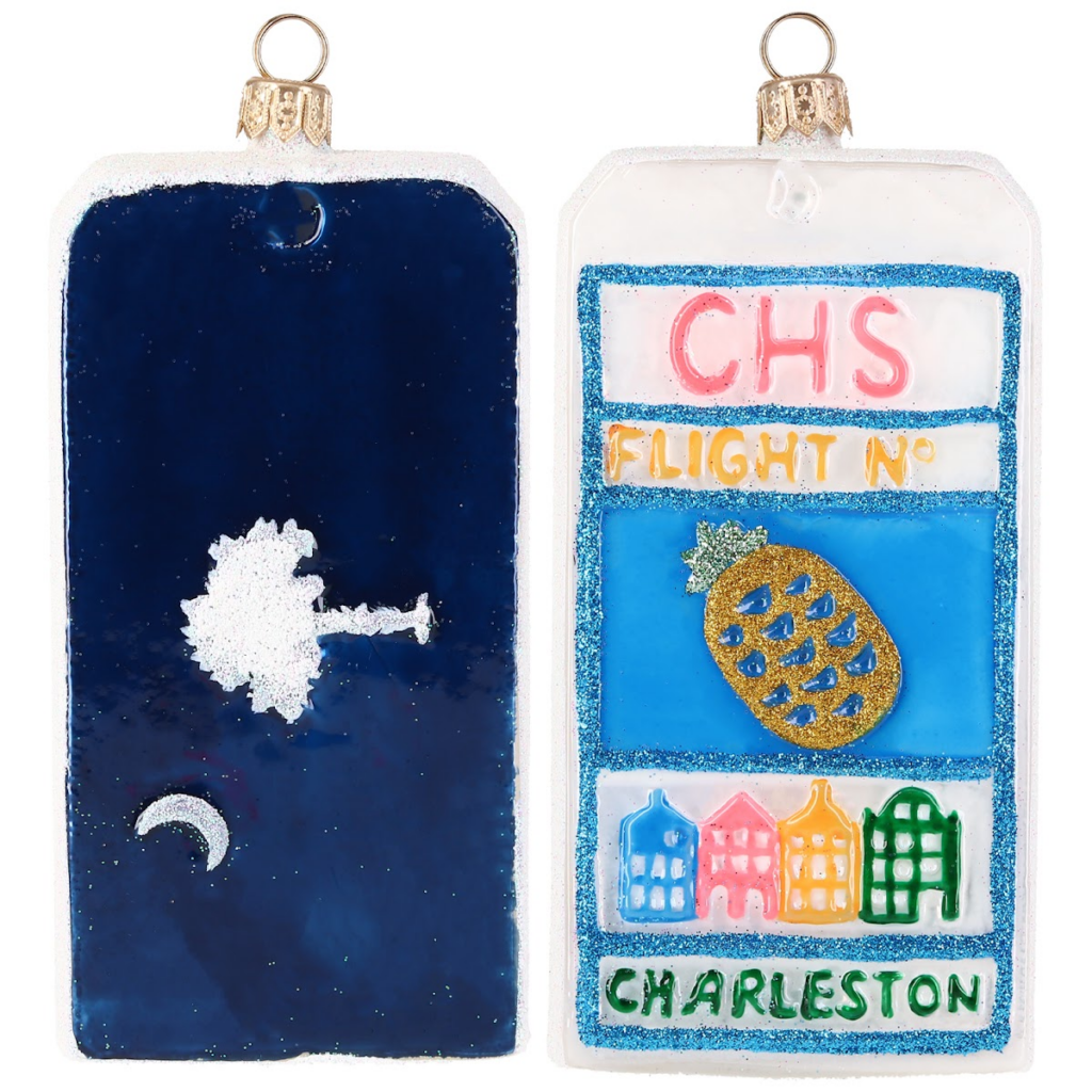 An image of two luggage tag ornaments from the Luggage Tag Joy to the World Collection