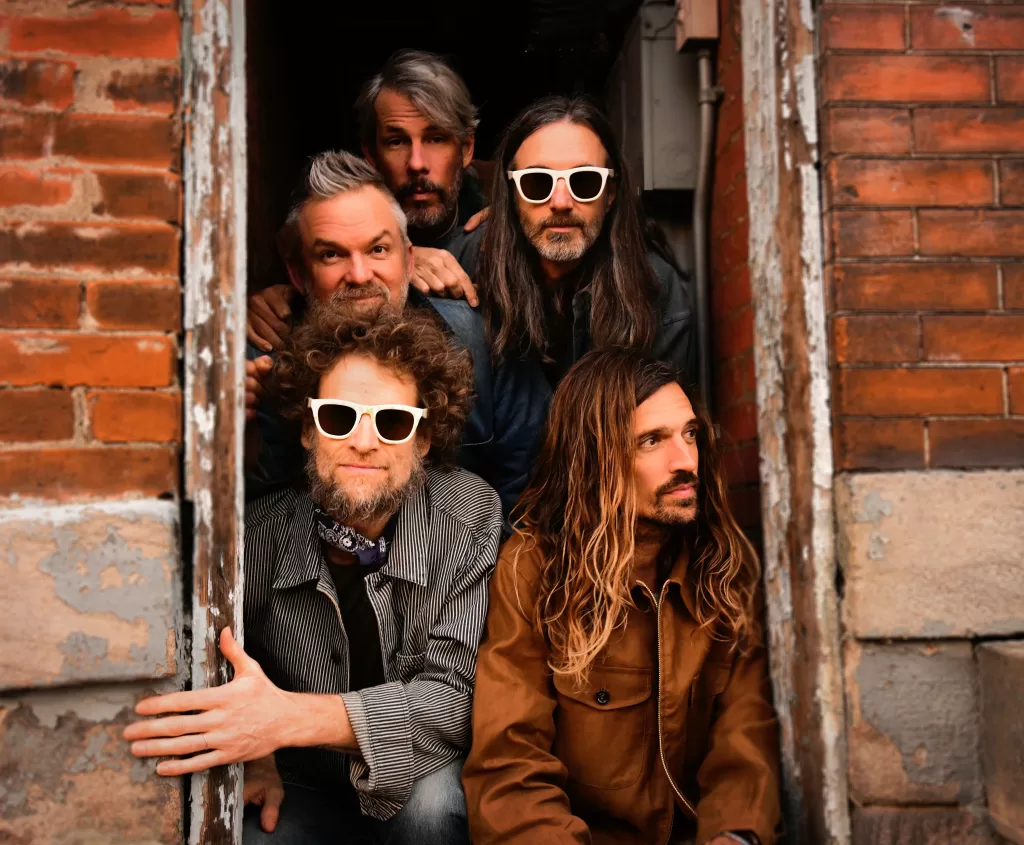 An image of band members of music group DISPATCH
