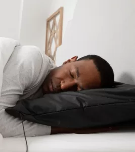 An image of a man sleeping on the Earthing Grounding Pillow Cover