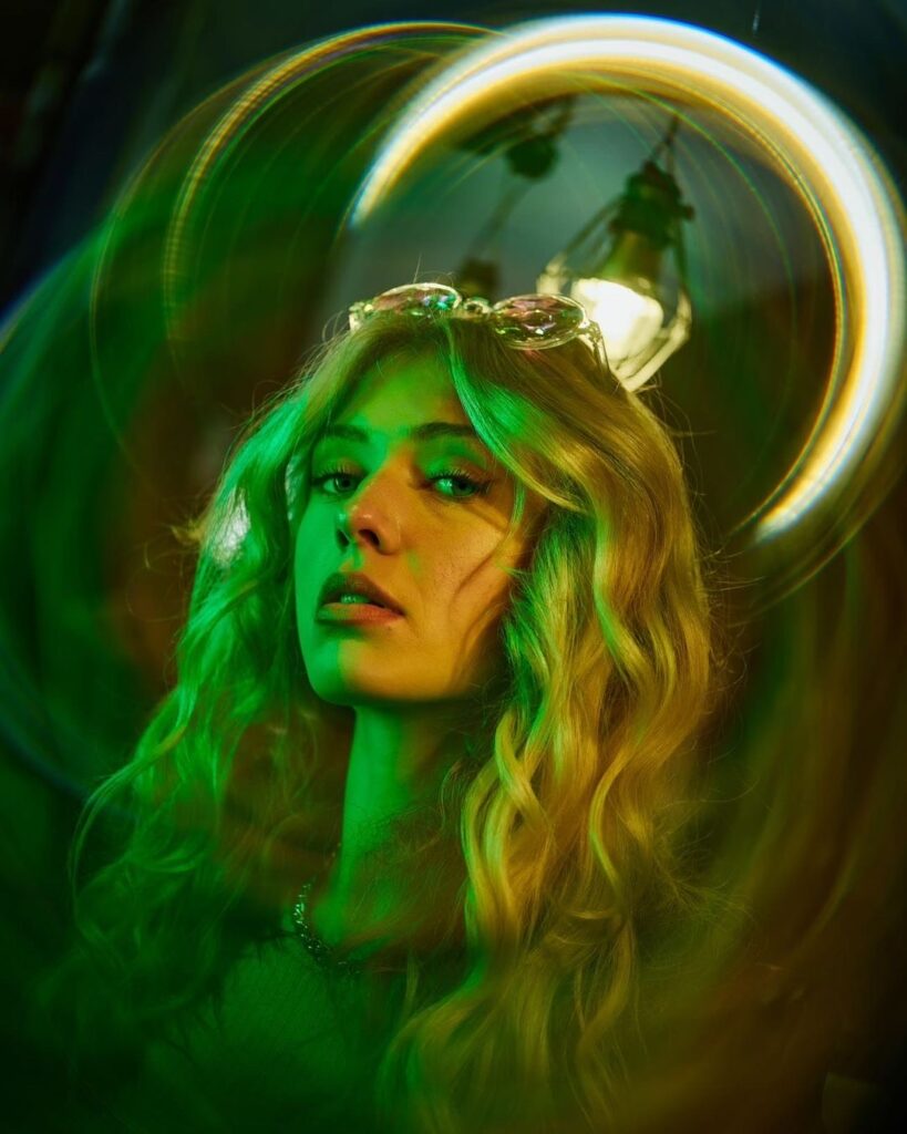 A behind-the-scenes image of UGC creator and actress, Sophie Jordan Collins