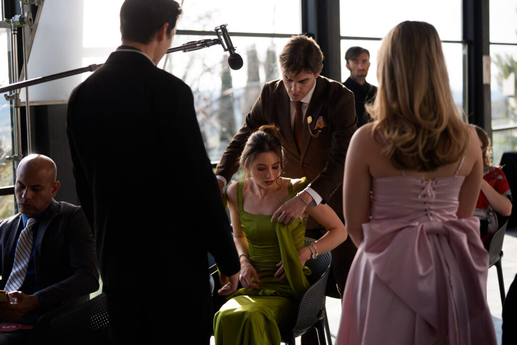 An image of Gabrielle working on set behind-the-scenes