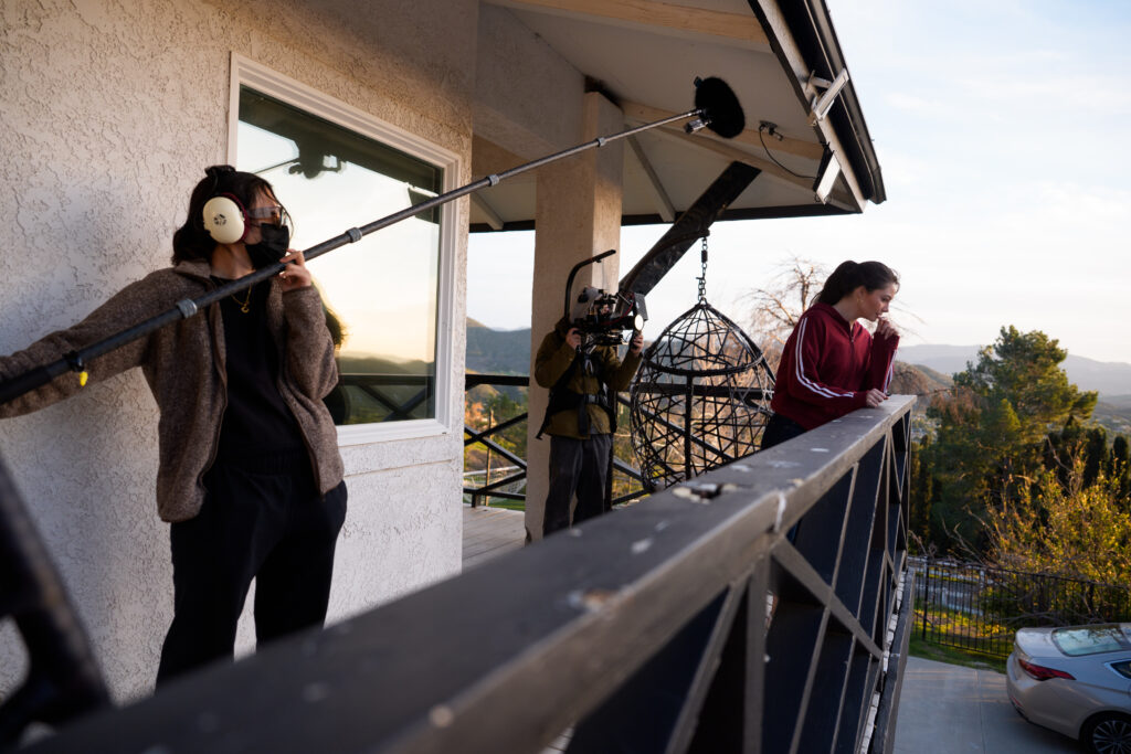 An image of Gabrielle filming behind-the-scenes