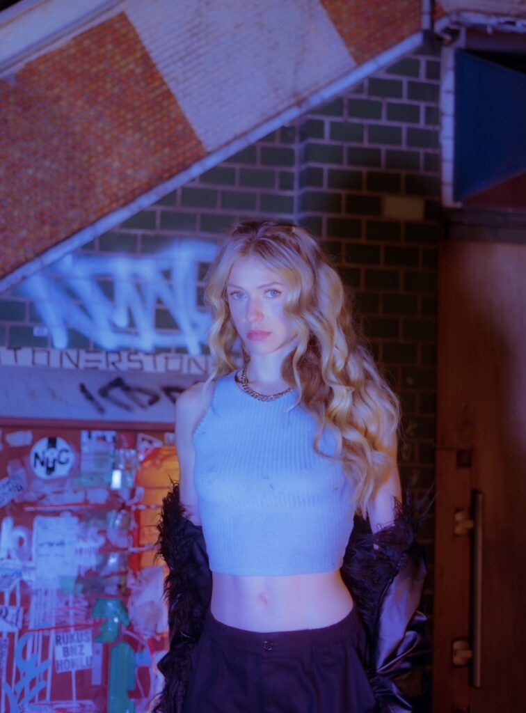 A behind-the-scenes image of UGC creator and actress, Sophie Jordan Collins