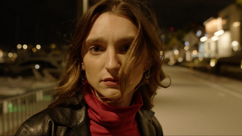 Still of vertical actress Sophia DeLucchi filming